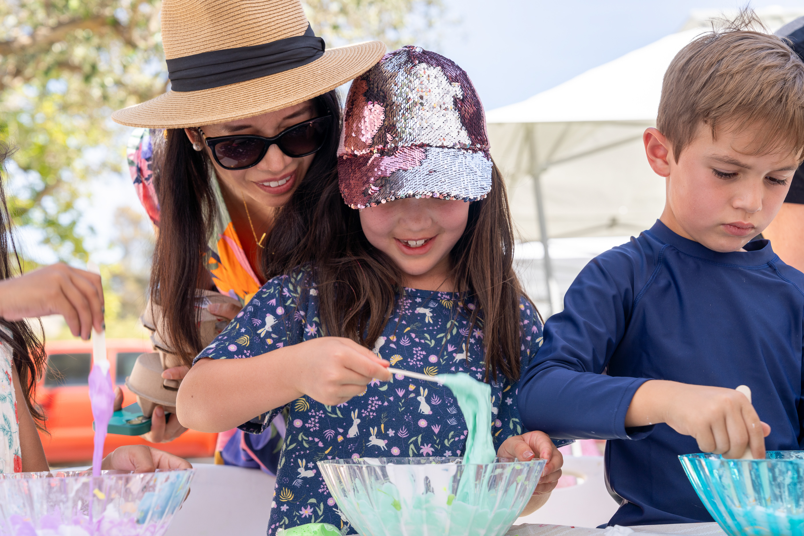 Children participating in an Oside Handmade craft experience